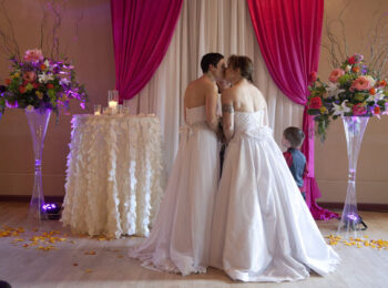 Brides Kissing Photo