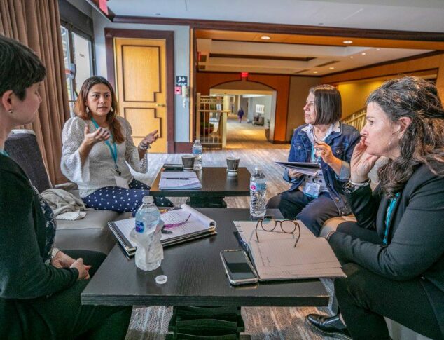 UIA National Summit conference attendees engage in facilitated dialogue