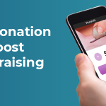 A person donates online on their cell phone.